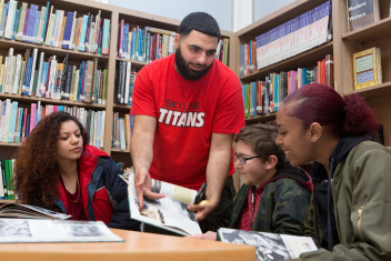 Group of high school students in the library Deeper learning prepares students to apply content knowledge, think critically, and work collaboratively.